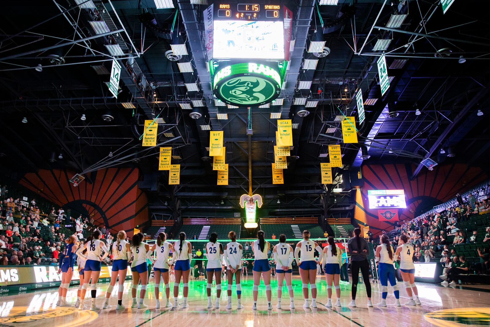 The San Jose State University Spartans line up for the playing of the national anthem and player introductions for their NCAA Mountain West women's volleyball game against the Colorado State University Rams in Fort Collins, Colo., on Thursday, Oct. 3, 2024. (Santiago Mejia/San Francisco Chronicle via AP)