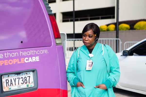 Susan Ellis, employee at Wellstar, stands outside the Atlanta Medical Center on Monday, October 31, 2022, in Atlanta. Ellis worked at Atlanta Medical Center before its closing and has now been relocated to Wellstar Kennestone Hospital in Cobb County. CHRISTINA MATACOTTA FOR THE ATLANTA JOURNAL-CONSTITUTION