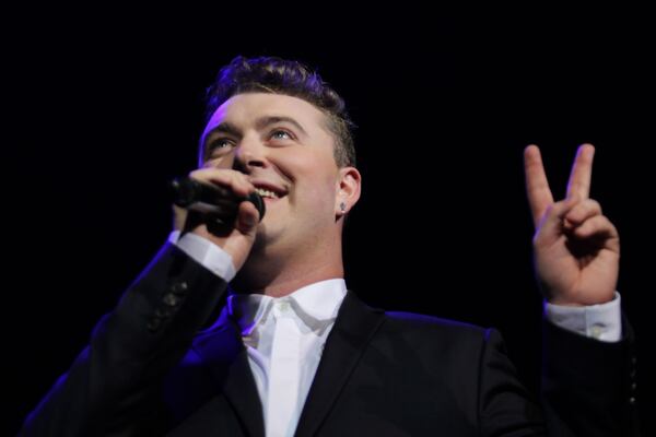 Oct. 6, 2014 - ATLANTA - British soul singer Sam Smith performing before a sold out audience at the Tabernacle Monday. Smith holds up two fingers in reference to his where his debut album reached on U.S. charts. (Akili-Casundria Ramsess/Special to the AJC) There is a definite authenticity to Smith's brand of soul. Photo: Akili-Casundria Ramsess/Special to the AJC