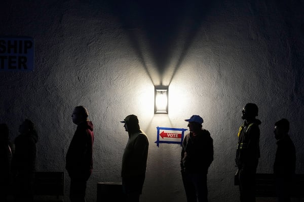 Voters stand in line outside a polling place at Madison Church, Tuesday, Nov. 5, 2024, in Phoenix, Ariz. (AP Photo/Matt York)