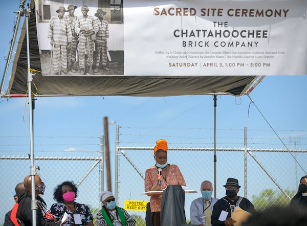 Community representative Gina Bilingsly addresses the crowd gathered at the site of the former Chattahoochee Brick Company during a sacred event to commemorate the lives lost during the period the company used the convict lease system. The event included a procession, prayers, libations, community testimonials and site consecration Saturday, April 3, 2021, in Atlanta. (Photo: Daniel Varnado for The Atlanta Journal-Constitution)