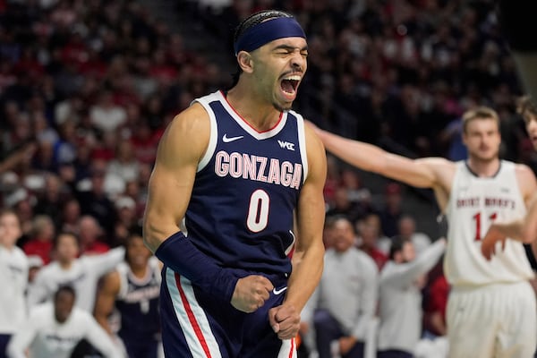 Gonzaga guard Ryan Nembhard (0) celebrates after a play against Saint Mary's during the first half of an NCAA college basketball championship game in the West Coast Conference men's tournament Tuesday, March 11, 2025, in Las Vegas. (AP Photo/John Locher)