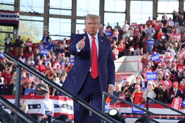 Republican presidential nominee former President Donald Trump wraps up a campaign rally at J.S. Dorton Arena, Monday, Nov. 4, 2024, in Raleigh, N.C. (AP Photo/Evan Vucci)