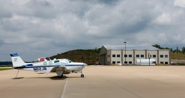 June 25, 2014 - Paulding County - Planes are parked on the tarmac in an area where jet operations are planned. Construction is under way on new hangers (right). Taxi way expansion has been completed, and construction continues in FBO area of Paulding County Airport. First, Delta CEO Richard Anderson said he would fight Paulding County's effort to commercialize its airport. Then residents filed four legal challenges. Now, the city of Atlanta is threatening legal action, saying Paulding, which purchased land from Atlanta for the airport back in 2007, is in breach of contract on that deal. Paulding officials deny that and say Atlanta's opposition flies in the face of the regionalism that Mayor Kasim Reed spoke about to leaders there a few years ago. BOB ANDRES / BANDRES@AJC.COM