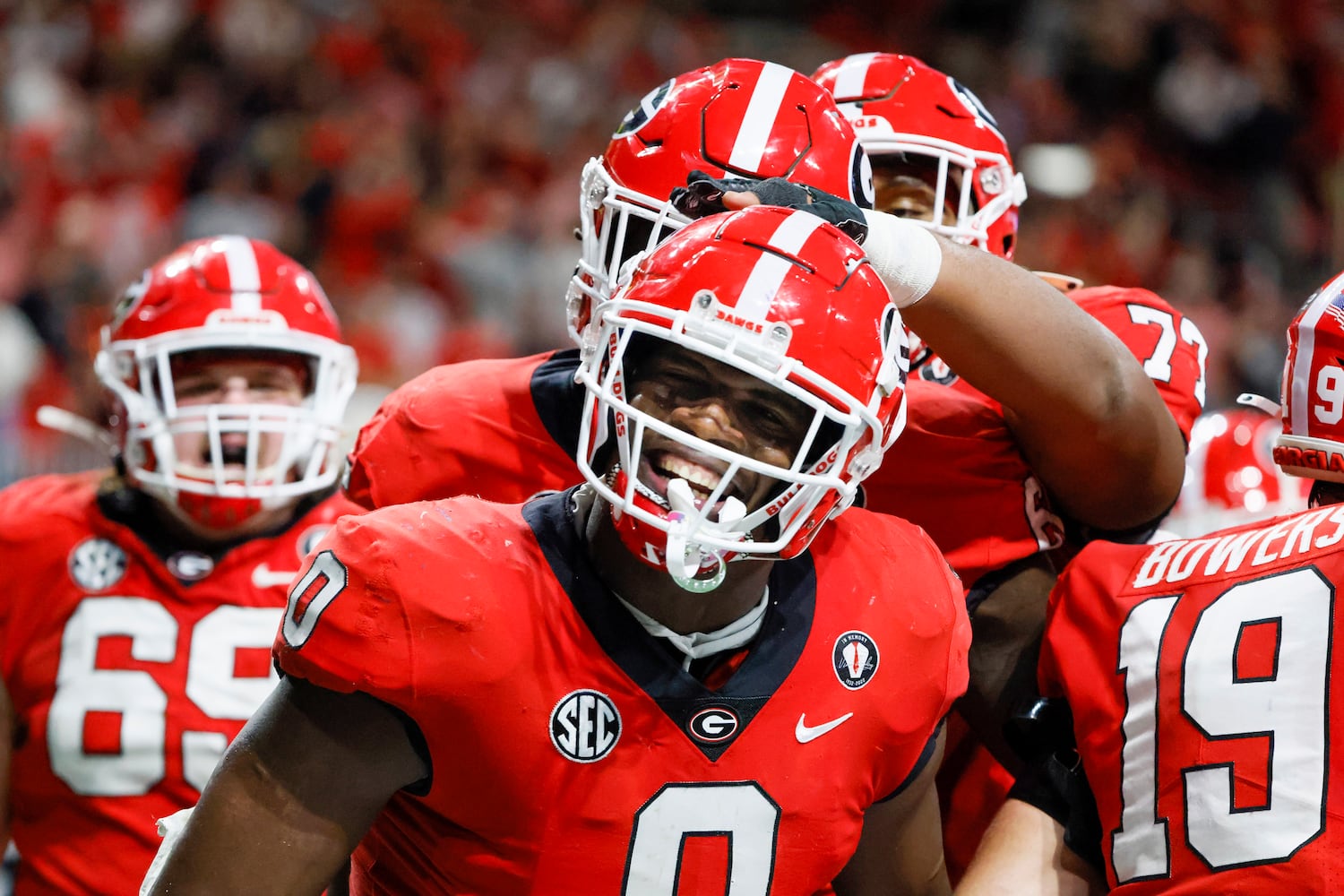 Georgia Bulldogs tight end Darnell Washington (0) celebrates a 14-yard touchdown against the LSU Tigers during the second half of the SEC Championship Game at Mercedes-Benz Stadium in Atlanta on Saturday, Dec. 3, 2022. (Bob Andres / Bob Andres for the Atlanta Constitution)