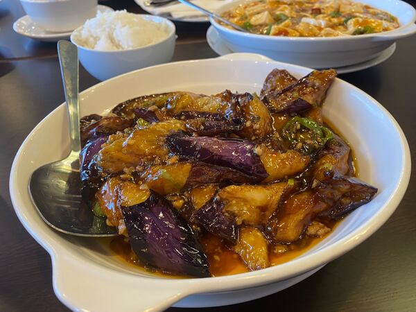 Eggplant slicked in garlic sauce is a recommended vegetarian dish at Bun Factory. Ligaya Figueras/ligaya.figueras@ajc.com