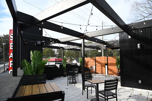 Bankhead Seafood has a total seating capacity of 135, including the upstairs rooftop deck (shown here) and the enclosed front patio. (Hyosub Shin/AJC)