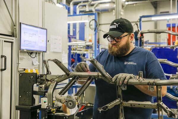 Jonathan Pitts prepares a product at the Linde Wiemann factory and distribution center in Lavonia. (ALYSSA POINTER/ALYSSA.POINTER@AJC.COM)