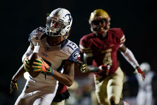 Tift County's Rashod Bateman (13) catches a pass for a touchdown during a GHSA playoff quarterfinal game between Brookwood and Tift County on Friday, Nov. 24, 2017, in Snellville, Ga. (AJ Reynolds/Special)