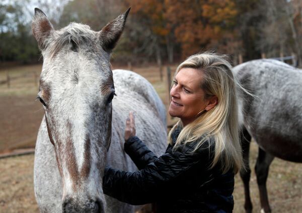 Marty Kemp and Lula, one of the Kemps' horses. AJC photo: Bob Andres