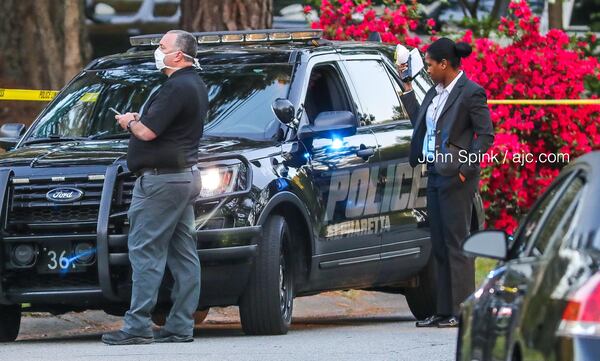 Three people were stabbed inside a home on Nathan Circle in Alpharetta. 