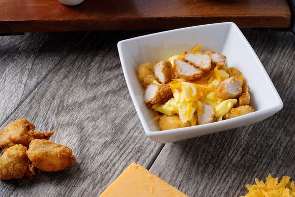 The Hash Brown Scramble is made with hash browns, scrambled eggs, a Monterey Jack and cheddar cheese blend and a choice of sliced Chick-fil-A Nuggets or sausage. (Photo via Chick-fil-a)