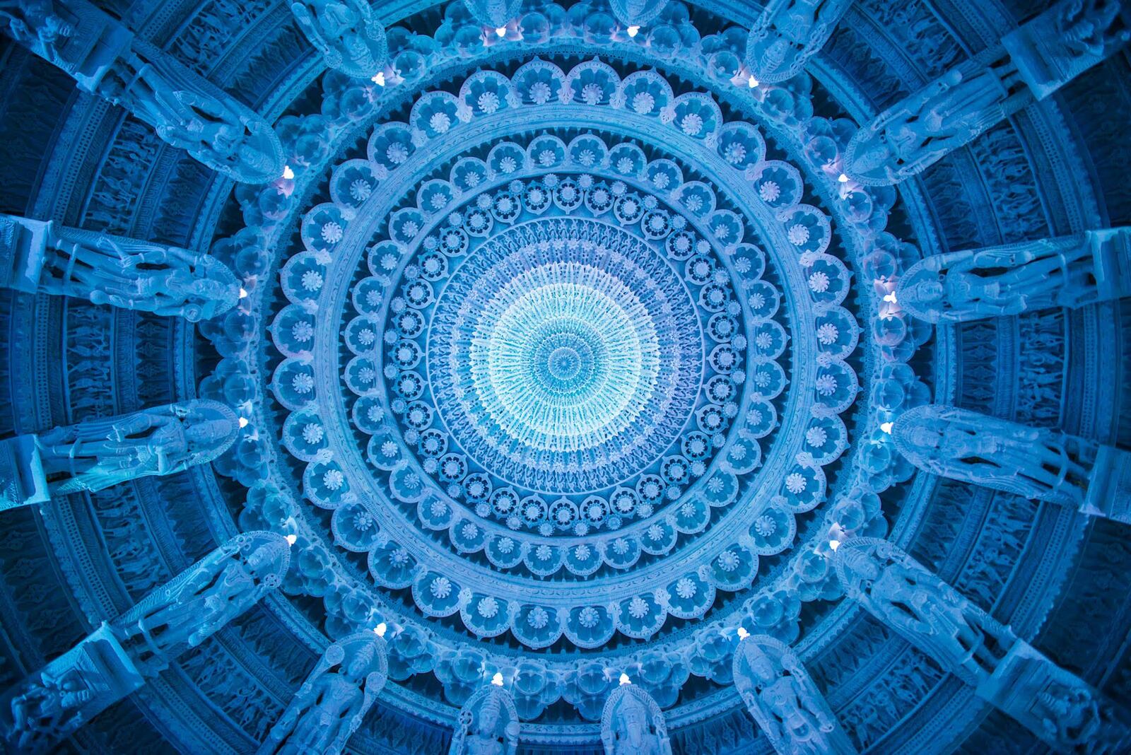 A stone chandelier hangs from the central dome of BAPS Shri Swaminarayan Mandir in Lilburn. It features stacked marble rings trimmed with LED lighting and is surrounded by 16 figures that represent the stages of a Hindu person’s life. Contributed by BAPS Shri Swaminarayan Mandir