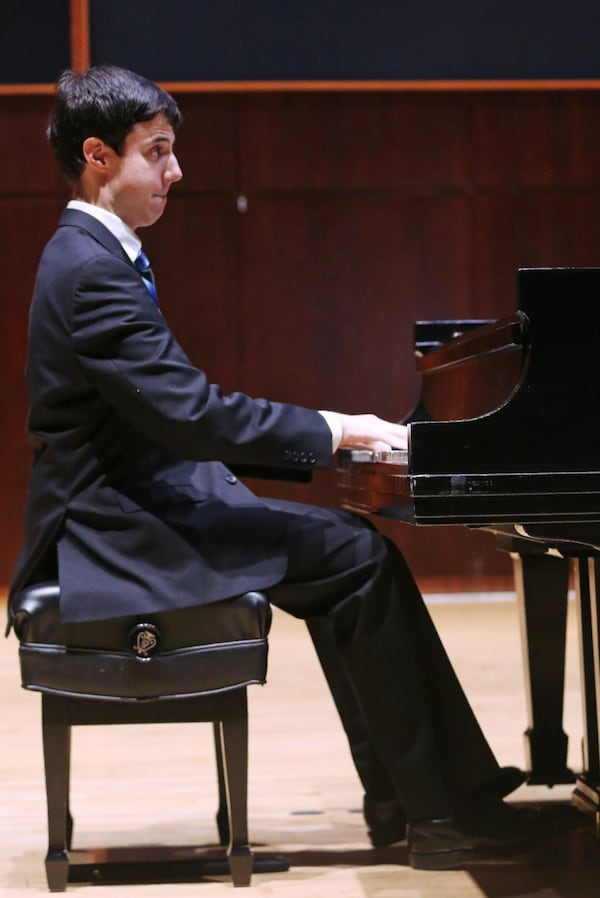 Timothy Jones, 26, plays the piano at Georgia State University in Atlanta on Monday, August 6, 2019.Christina Matacotta/Christina.Matacotta@ajc.com