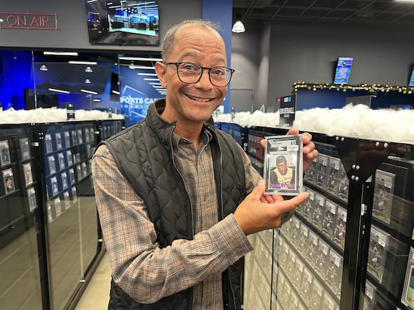 Leon Jobe met Willie Stargell as a child and picked up an original 1967 Stargell Topps card for $40 at CardsHQ, graded 6 on a scale of 1-10 by PSA. RODNEY HO/rho@ajc.com