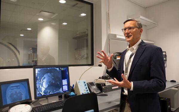 John Oshinksi gives a tour of new research equipment at Emory University’s new Health Sciences Research Building II on Wednesday, March 15, 2023, in Atlanta. The new facility houses state-of-the-art equipment and laboratories that will be the site for biomedical research conducted at the university. CHRISTINA MATACOTTA FOR THE ATLANTA JOURNAL-CONSTITUTION.  