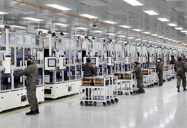 Workers make lithium-ion batteries for electric vehicles at the SK Battery America plant in Jackson County. (SK Battery America)