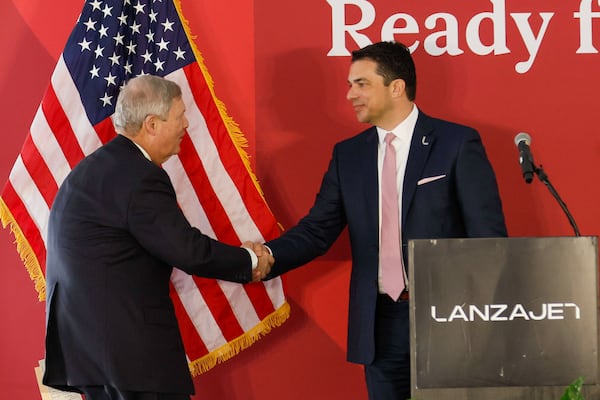 Jimmy Samartzis, CEO of LanzaJet, greets keynote U.S. Secretary of Agriculture Tom Vilsack as he walks to the podium during the grand opening of its new plant in Soperton, GA, on Wednesday, January 24, 2024. LanzaJet is the world’s first and only ethanol-to-sustainable aviation fuel (SAF) production facility.
Miguel Martinez /miguel.martinezjimenez@ajc.com