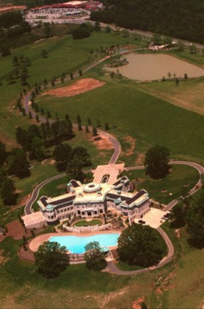 Evander Holyfield's mansion faced foreclosure