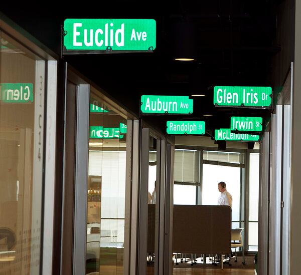 A hallway at Salesforce's Atlanta office is lined with local street signs as part of the fun atmosphere. It was voted the No 1 topworkplace for large companies. (Photo by Phil Skinner)