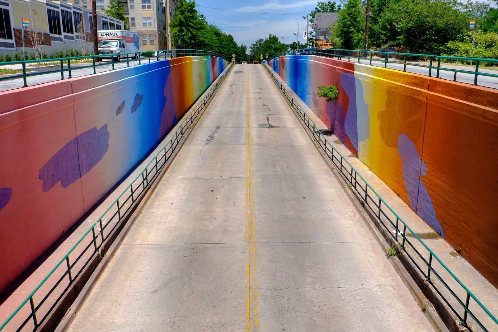 Living Walls Photography By Joshua Gwyn Last year Atlanta-based public art organization Living Walls recruited New Orleans artist MOMO and 50 volunteers to paint the Boulevard underpass. The mural has now been included in the Google Street Art Project.