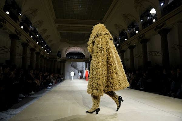 A model wears a creation as part of the Vivienne Westwood Fall/Winter 2025-2026 Womenswear collection presented in Paris, Saturday, March 8, 2025. (Photo by Scott A Garfitt/Invision/AP)