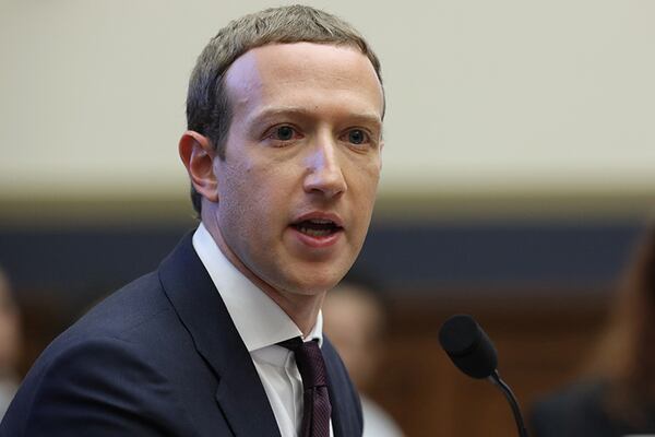 Facebook co-founder and CEO Mark Zuckerberg testifies before the House Financial Services Committee in the Rayburn House Office Building on Capitol Hill. Zuckerberg testified about Facebook's proposed cryptocurrency Libra, how his company will handle false and misleading information by political leaders during the 2020 campaign and how it handles its users data and privacy.