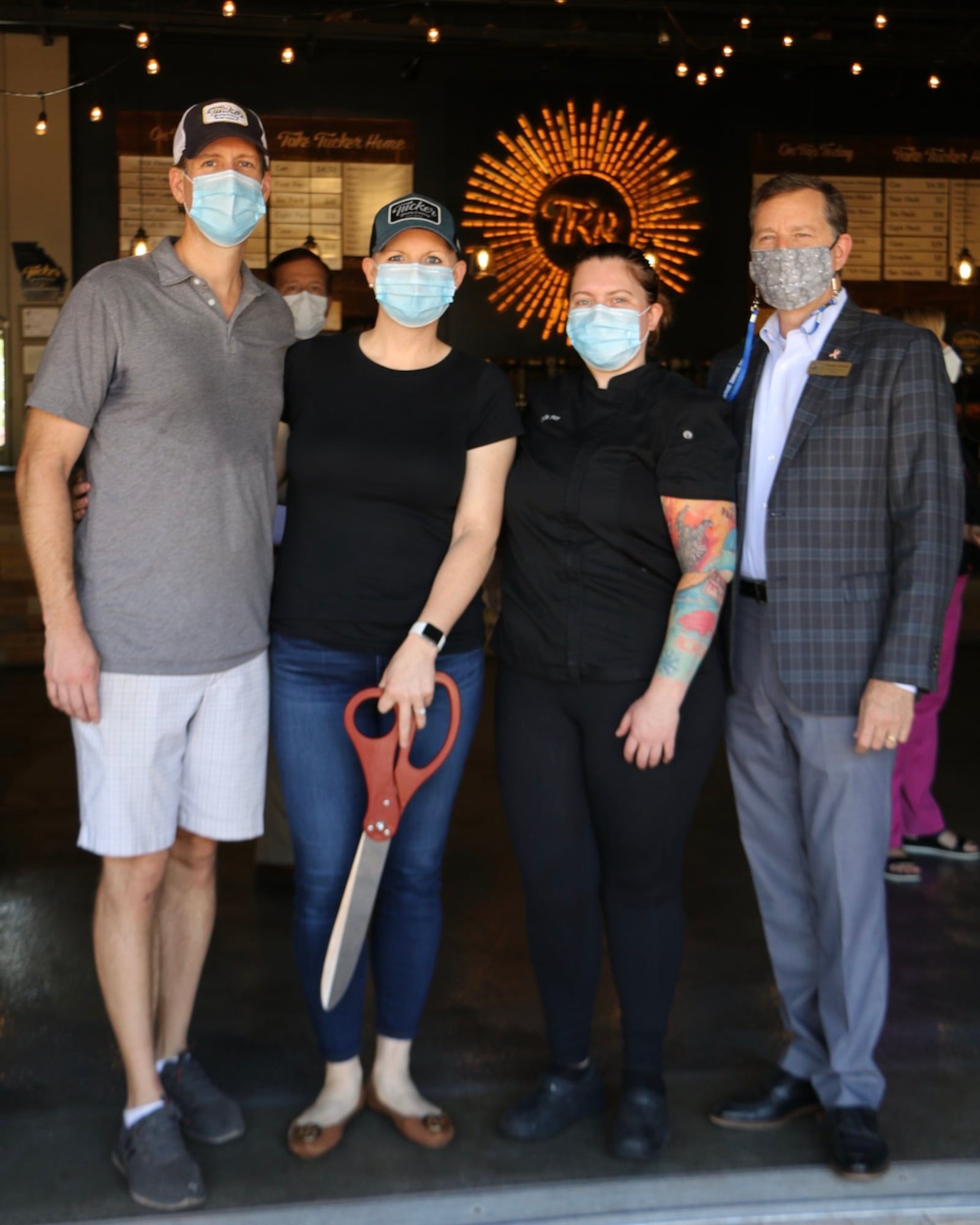 Owners Ryan Chapman and Ashley Hubbard Chapman, executive chef Nicole Fey and Tucker Mayor Frank Auman are shown at the Tucker Brewing kitchen ribbon cutting.
Contributed by Eliana Barnard, Tucker Brewing Co.