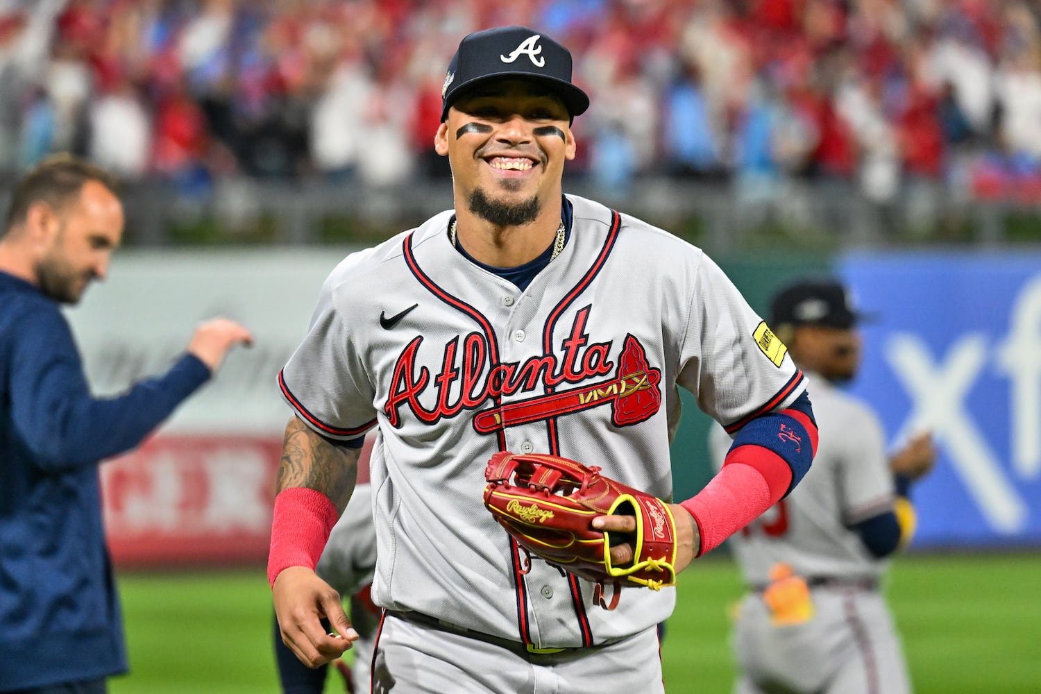 Atlanta Braves shortstop Orlando Arcia (11) is all smiles during NLDS Game 4 against the Philadelphia Phillies at Citizens Bank Park in Philadelphia on Thursday, Oct. 12, 2023.   (Hyosub Shin / Hyosub.Shin@ajc.com)