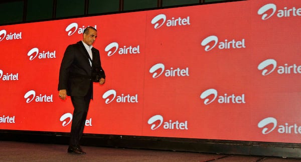 FILE- In this Tuesday, April 10, 2012, file photo, Bharti Airtel Ltd. Chairman and Managing Director Sunil Mittal walks as he attends a press conference during launch of Airtel's 4G services, in Kolkata, India. (AP Photo/Bikas Das, File)