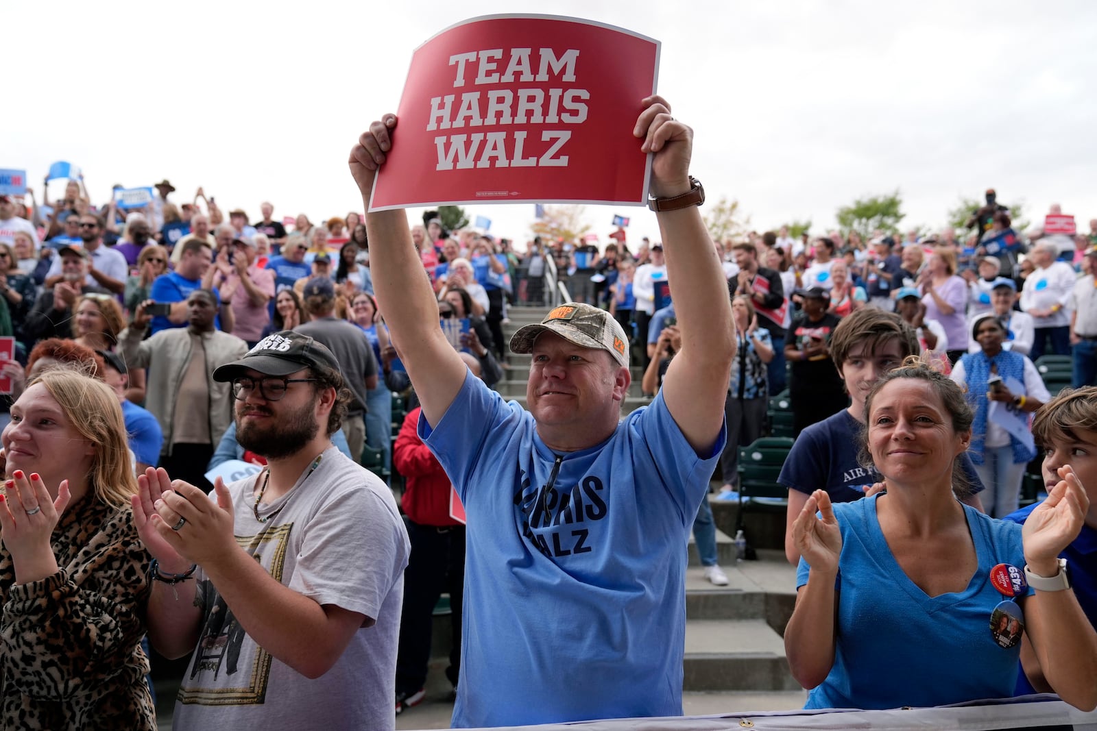 Supporters cheer Minnesota Gov. Tim Walz, the Democratic vice presidential nominee, during a campaign rally in Nebraska over the weekend.