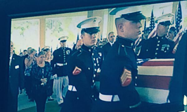 Cathy Wells follows her son's procession at Woodstock First Baptist Church. Photo: Jennifer Brett