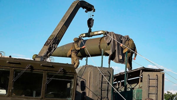 FILE - In this photo released by Russian Defense Ministry Press Service on Tuesday, May 21, 2024, Russian troops load an Iskander missile as part of drills to train the military for using tactical nuclear weapons at an undisclosed location in Russia. (Russian Defense Ministry Press Service via AP, File)