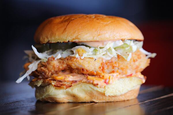 The Boxcar sandwich consists of fried chicken, pimento cheese, peach slaw, house pickles and spicy mayo. Courtesy of Boxcar Betty’s