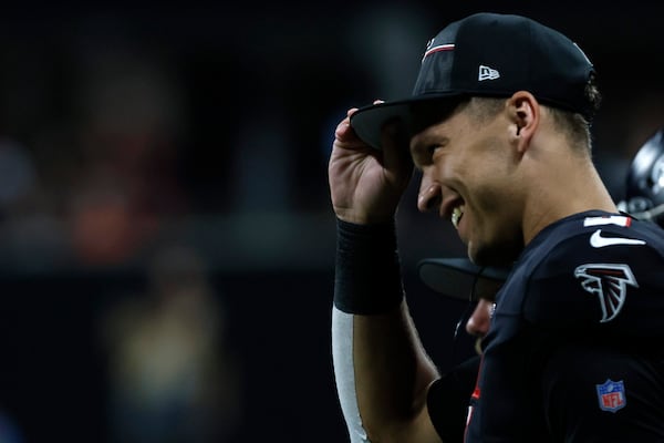  Falcons quarterback Desmond Ridder (9) is seen smiling on the sidelines after being benched; he played the first quarter in a preseason exhibition game against the Cincinnati Bengals at Mercedes-Benz Stadium on Friday, August 18, 2023, in Atlanta.
Miguel Martinezmiguel.martinezjimenez@ajc.com
