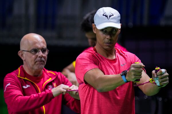 Spain's Rafael Nadal takes part in a training session at the Martin Carpena Sports Hall, in Malaga, southern Spain, on Friday, Nov. 15, 2024. (AP Photo/Manu Fernandez)