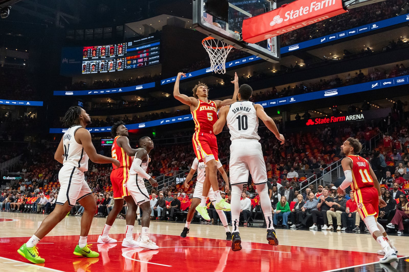 Atlanta Hawks guard Dyson Daniels (5) goes up for a layup during the first half of an NBA basketball game against the Brooklyn Nets, Wednesday, Oct. 23, 2024, in Atlanta. (AP Photo/Jason Allen)