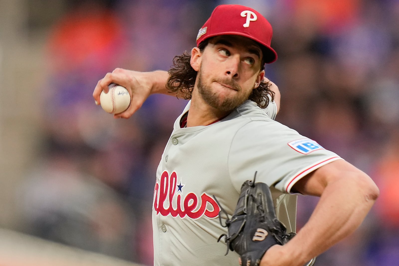 Philadelphia Phillies pitcher Aaron Nola delivers against the New York Mets during the fourth inning of Game 3 of the National League baseball playoff series, Tuesday, Oct. 8, 2024, in New York. (AP Photo/Seth Wenig)