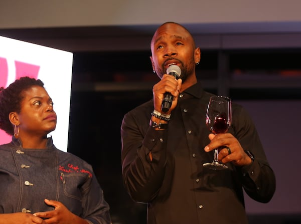 Charles Woodson, a former pro football player, speaks before the Culinary Kickoff Thursday night in Atlanta. Woodson was one of the emcees at the event, which benefited the Culinary Institute of America and the Big Brothers and Big Sisters of Metro Atlanta. EMILY HANEY/ EMILY.HANEY@AJC.COM