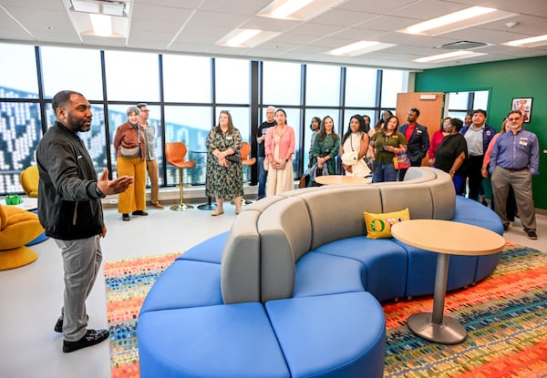 Justin Andrews, grandson of late soul superstar Otis Redding, leads a tour of the new Otis Redding Center for the Arts in downtown Macon. (Jason Vorhees / The Macon Melody newspaper)