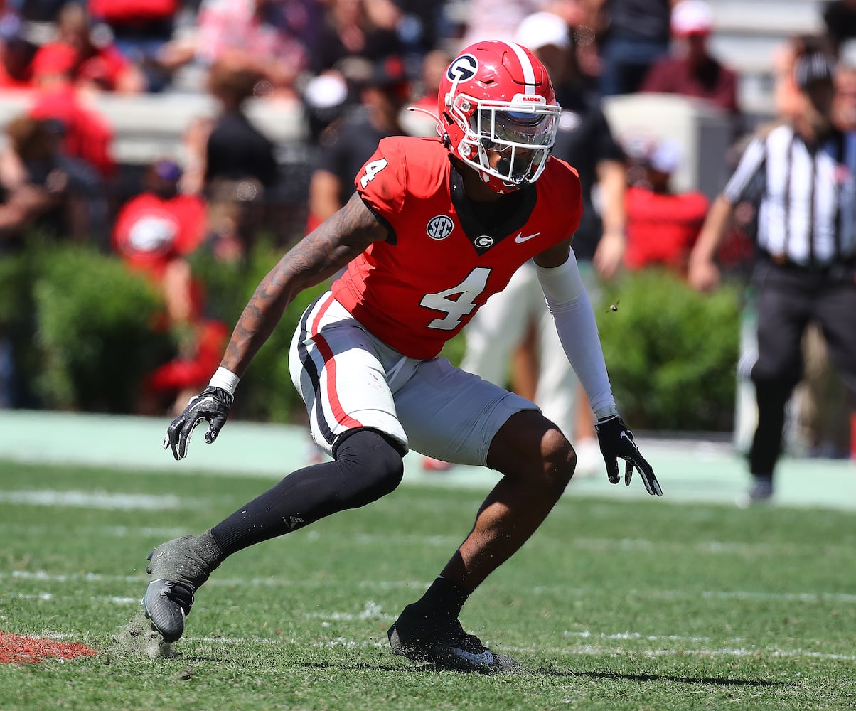 Georgia defensive back KJ Bolden works against the black team during the G-Day game.  Curtis Compton for the Atlanta Journal Constitution