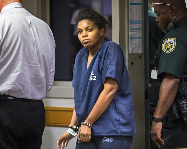 Abrianna Miller enters court Friday morning, Sept. 1, 2017, after she was charged with manslaughter in the May 26 death of her 2-year-old boy.