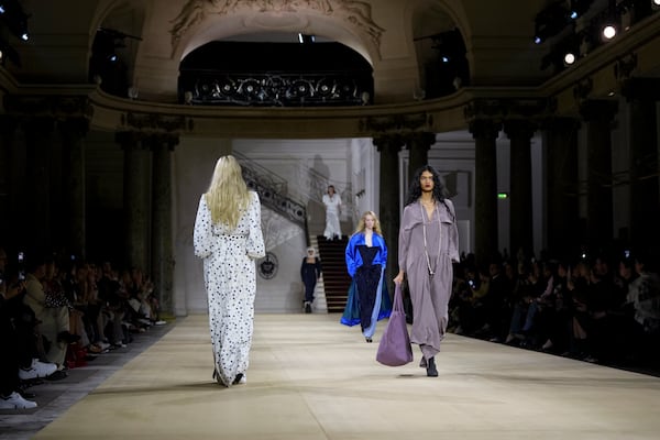 Models wear creations as part of the Vivienne Westwood Fall/Winter 2025-2026 Womenswear collection presented in Paris, Saturday, March 8, 2025. (Photo by Scott A Garfitt/Invision/AP)