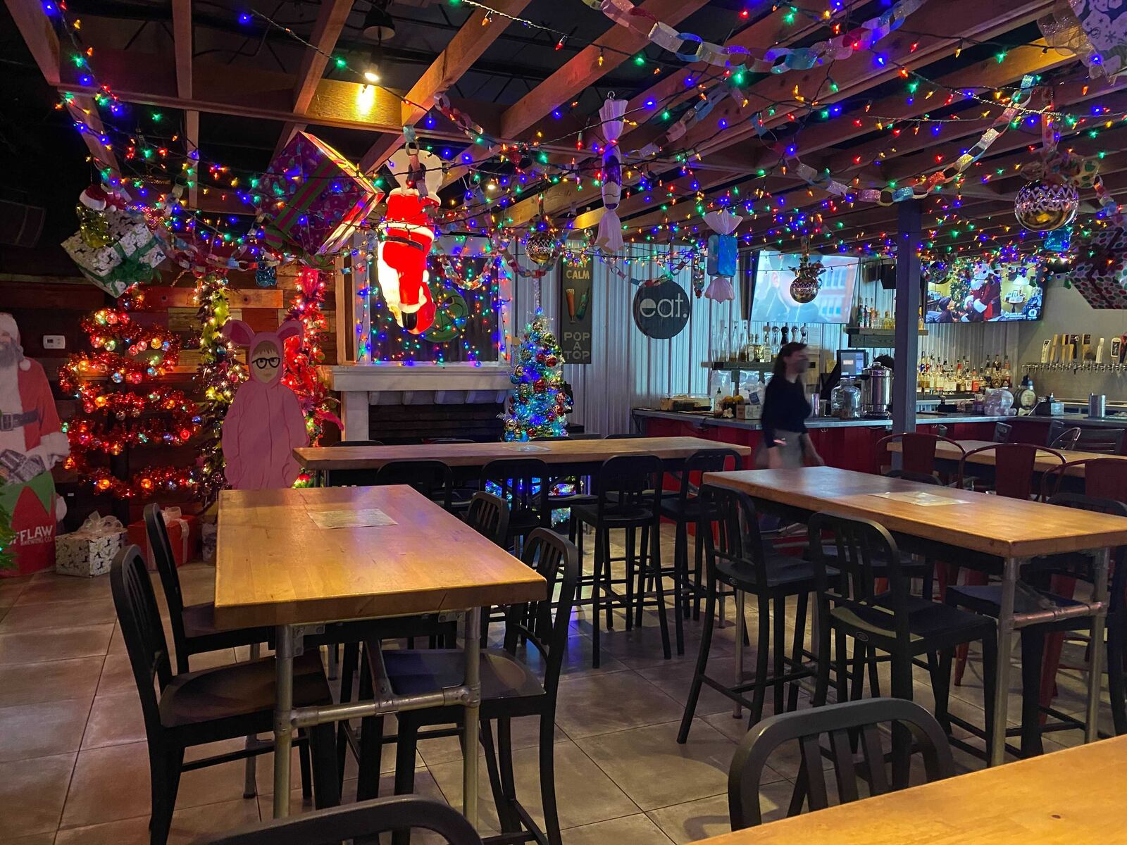 Founder Mike Duganier described Santa's Pub at Publico as “trailer park chic for Christmas.” Ligaya Figueras/ligaya.figueras@ajc.com