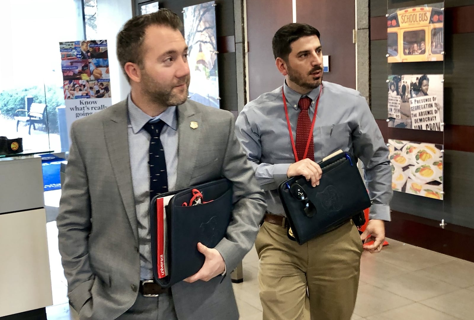 GBI agents Rocky Bigham, left, and Clinton Thomas interviewed AJC reporters Stephen Deere and Dan Klepal on Friday, March 16, 2018, concerning the city of Atlanta’s conduct in responding to open records requests. J. Scott Trubey/strubey@ajc.com.