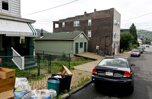 Pictured is the spot on East Pittsburgh's Grandview Avenue where unarmed teen Antwon Rose was shot and killed by a police officer Tuesday, June 19, 2018. Witnesses said Rose, 17, was shot in the back as he ran from a traffic stop.