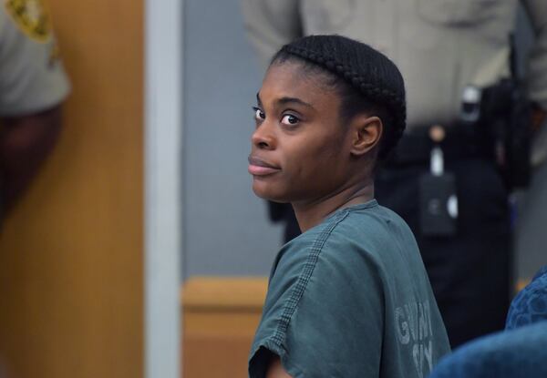 January 10, 2019 Lawrenceville - Defendant Tiffany Moss sits by herself as District Attorney Danny Porter (not pictured) speaks during a hearing before Gwinnett County Superior Court judge George Hutchinson III .HYOSUB SHIN / HSHIN@AJC.COM