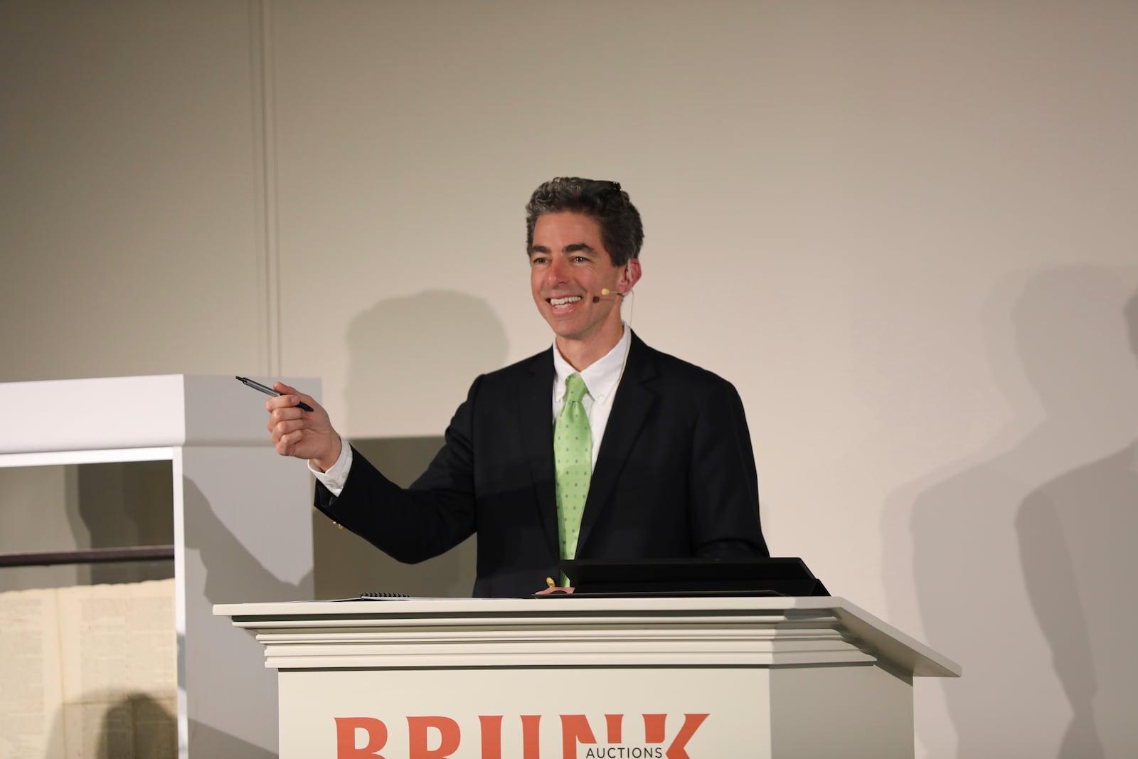 Brunk Auctions owner Andrew Brunk takes bids for a 1787 copy of the U.S. Constitution that sold for $9 million in Asheville, N.C., on Thursday, Oct. 17, 2024. (AP Photo/Jeffrey Collins)