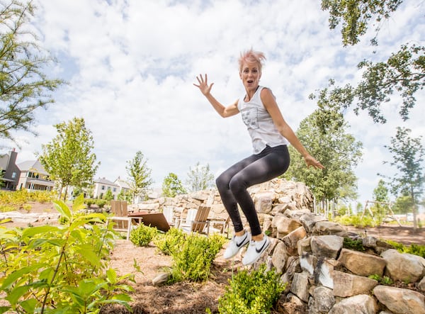 Shauna Galligan tends to her mind, body and soul while waiting for her next job as a stunt woman Monday, Aug 3, 2020.  Galligan moved to the Pinewood Forest Fayetteville community in March with her son where they foster pets and make use of the outdoor spaces in the community.   (Jenni Girtman for The Atlanta Journal-Constitution)