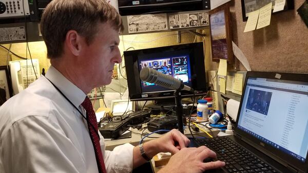 Radio reporter Jamie Dupree, who has been covering Washington for 30 years, works at his tiny booth on the Senate side of Capitol Hill. PHOTO: COURTESY JAMIE DUPREE